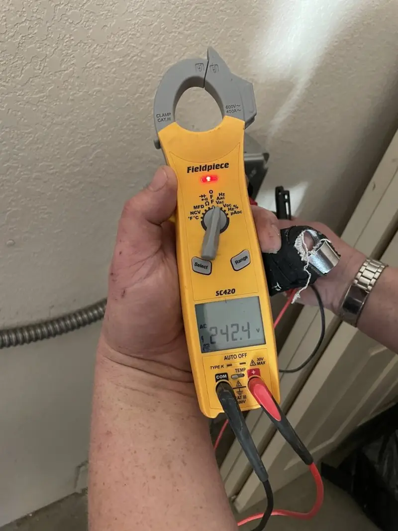Voltage testing with clamp meter during Generator Installation in North Highlands